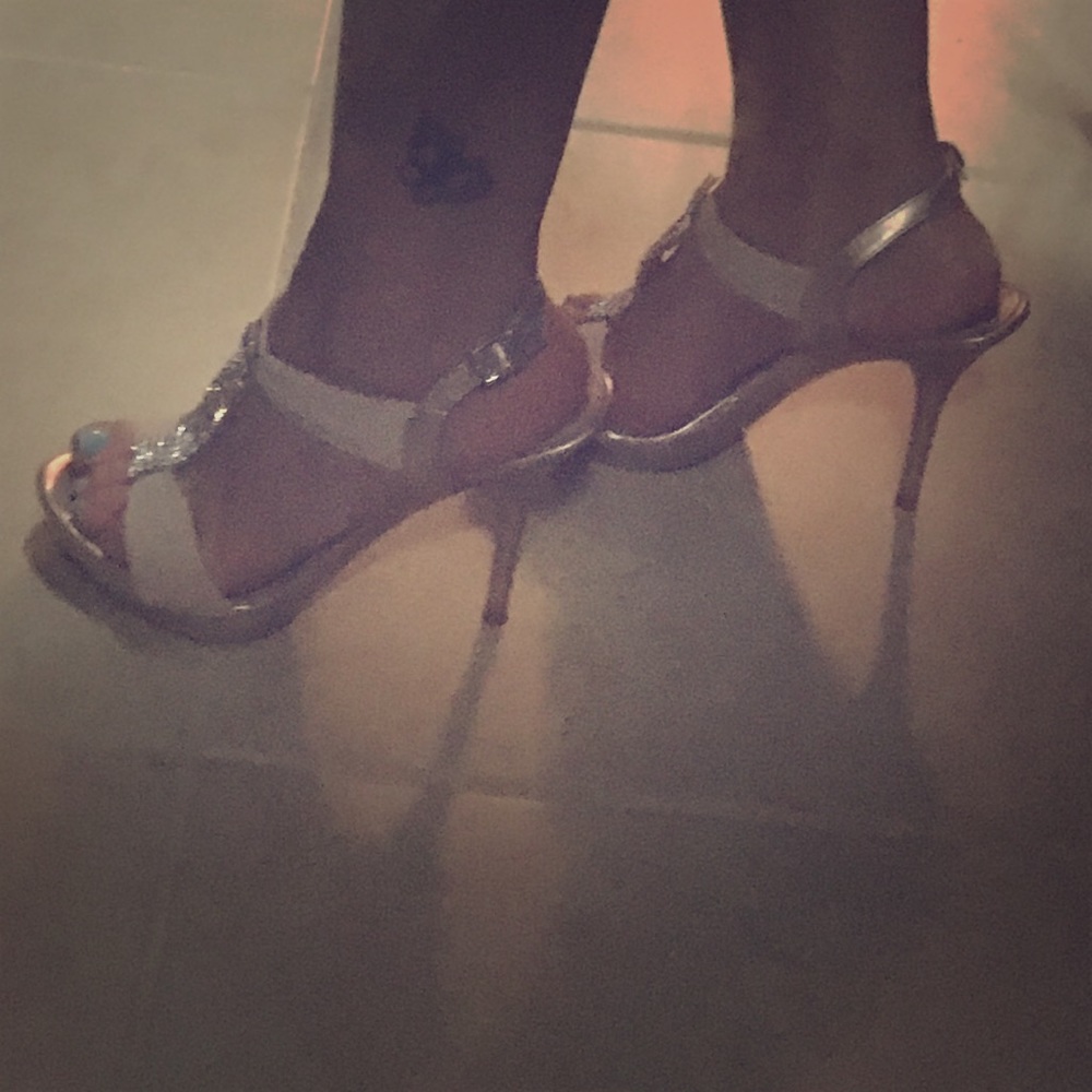 nude color heels with rhinestones.